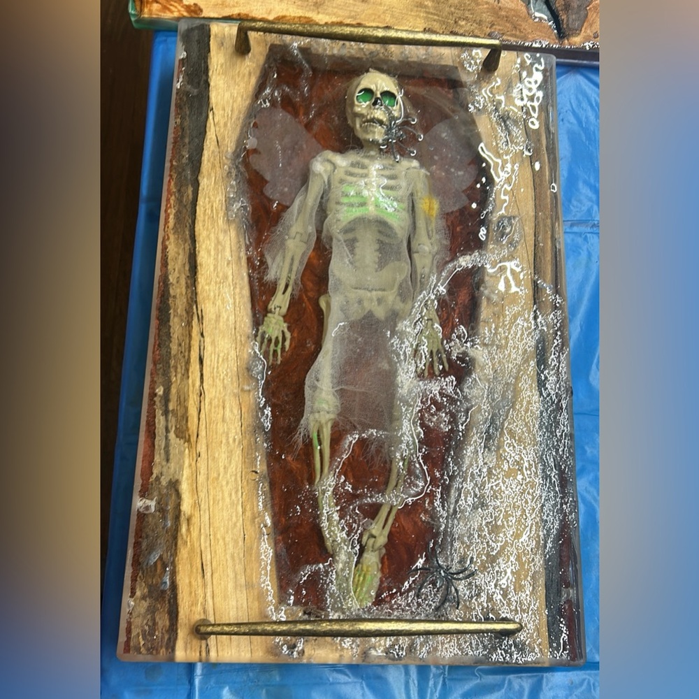This is “ Hallows Eve” she is a charcuterie board ! Done by TKStudioZ